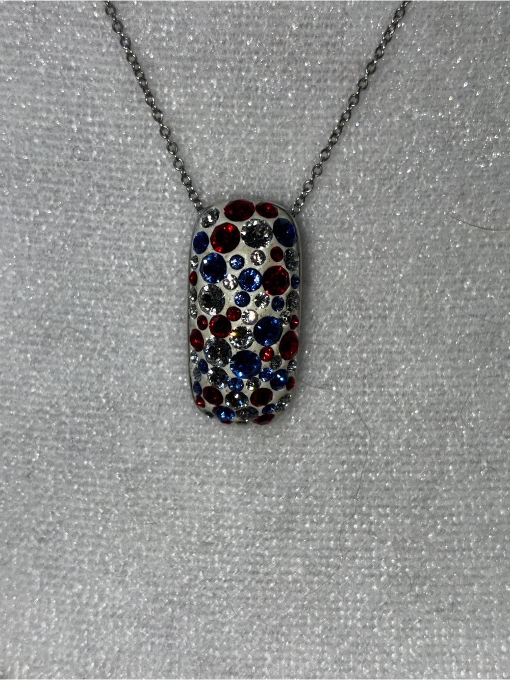 Touchstone Swarovski Crystals Silver Pendant Necklace with Red and Blue Crystals